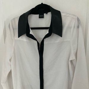 Woman’s white blouse with leather collar